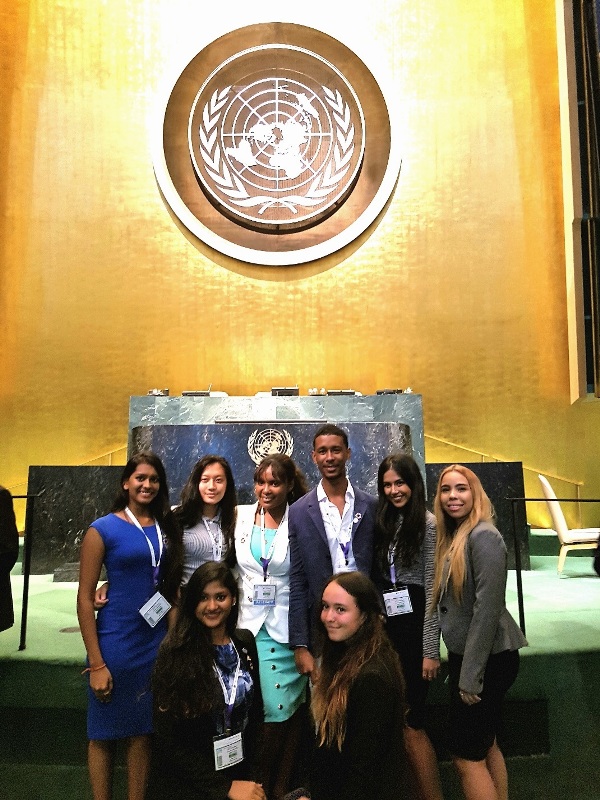 Group photo at the United Nations (l to r standing): Bhavini , Victoria, Annarose, Curtis, Sanjna, Kelly and (squatting) Raghavi and Anastasia