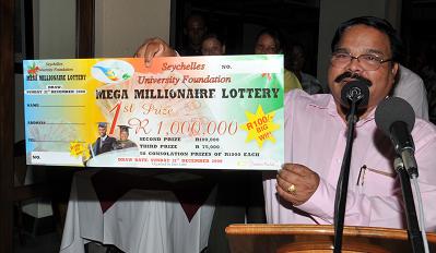 Dr Ramadoss launching the lottery. He also got a trophy