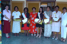The five long serving teachers in a souvenir photograph with Mrs Mondon (left), Mrs Rene (right) and Mrs Manes