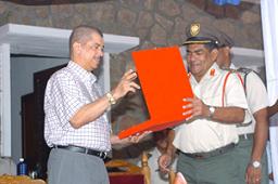 President Michel and Colonel Payer exchange gifts