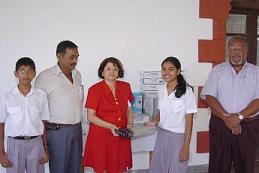 Dr Shobba accepting the donation from Janita Shah. (Inset) The late Mr Ravilal Shah
