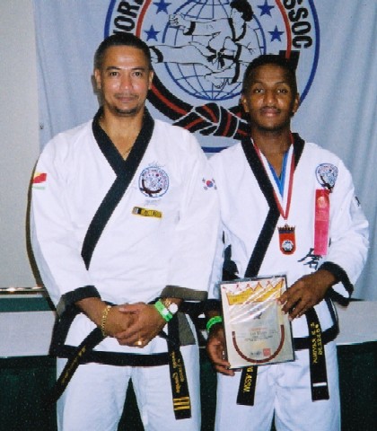 Kata with weapon gold medallist Ravinia (right) with Canaya