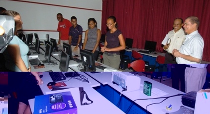 President Michel visits students at work in the computer laboratory during a tour of the university campus at Anse Royale