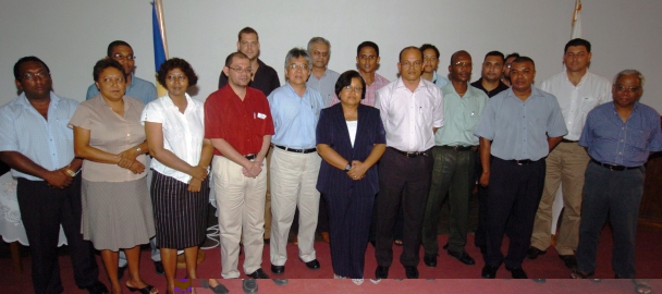 Representatives of the private sector who have sponsored scholarships in a souvenir photograph with former Education Minister Bernard Shamlaye, members of the university’s board and its deans of faculties