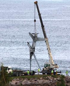 The MQ-9 drone being pulled out of the sea at the Seychelles International Airport