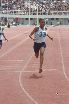 Athletics: Track and Field Meet-Laurence sets 400m girl record, Woodcock equals youth high jump best