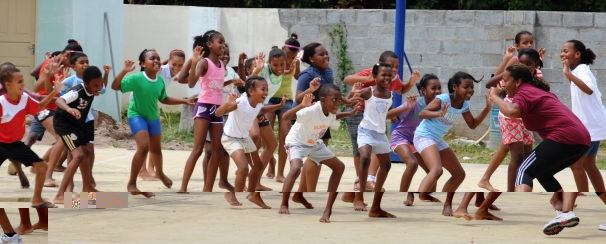 Children learning to keep fit with fitness instructor Dorothy Isidore