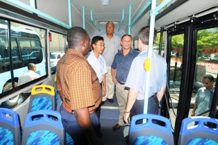 Guests viewing the interior of one of the new buses
