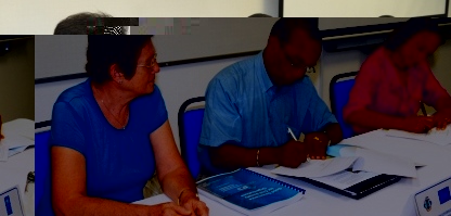 Mr Elizabeth and Ms Nanon signing the memorandum of understanding