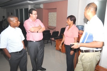 The delegation in discussion with CEO Crea during the visit at the National Tender Board