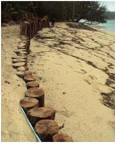 Anse Royale coastal protection project involving timber piling, rock beaching and notched groynes