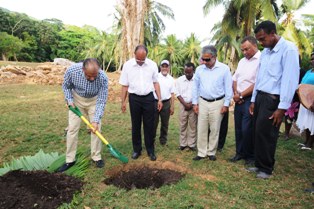 Dr Ramgoolam  planting a coco de mer seed at the arboretum