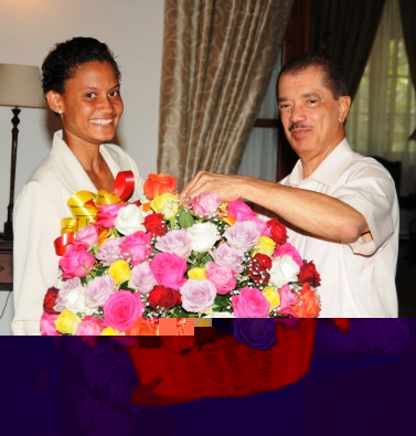 President Michel congratulates Lissa Labiche