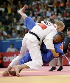 The first Seychellois to qualify for the London Games, judoka Dominic Dugasse (right) lost by 