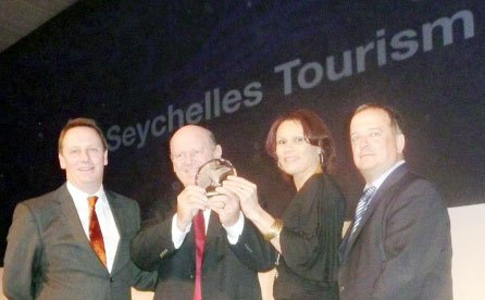 Minister St Ange and chief executive Grandcourt hold the prestigious World Routes 2012 award in recognition of Seychelles’ appreciation of the importance of the golden triangular approach of airlines, aviation authorities and tourism boards in moving tourism forward
