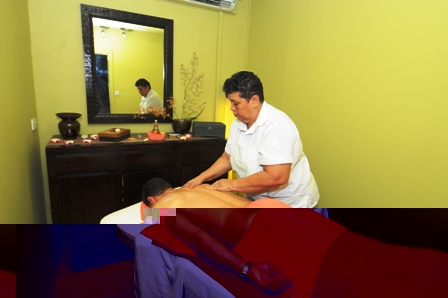 A male client having a body massage: the centre caters for both gender