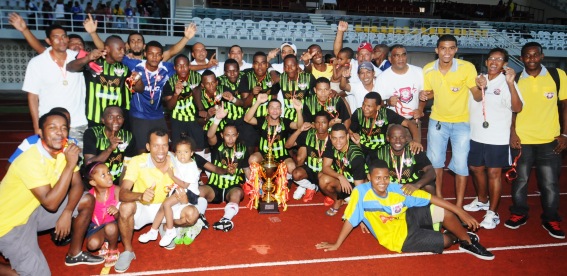 St Michel players celebrate winning a fourth consecutive President’s Cup