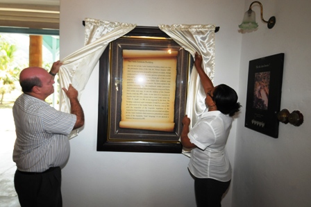 Minister St Ange, accompanied by Creole Institute director Penda Choppy, unveils the information plaque that highlights the institute’s importance as a national monument 