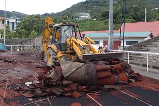 Athletics-Damaged tartan track being removed