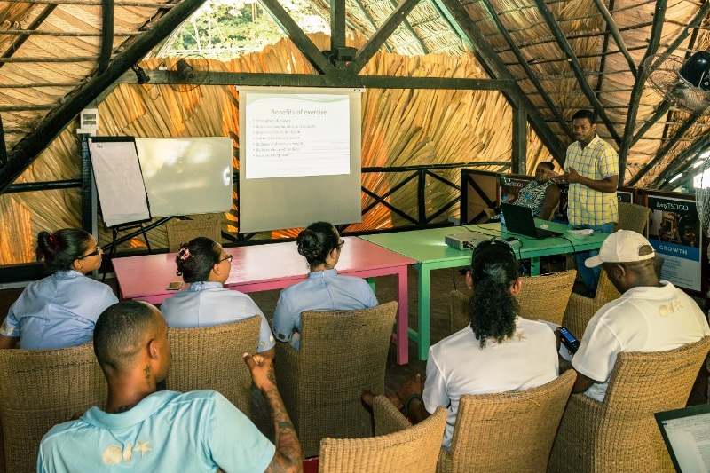 Staff attending the presentation about exercise by Mr Dodin