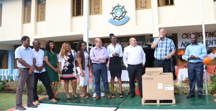 Former students donates photocopier to Mont Fleuri secondary