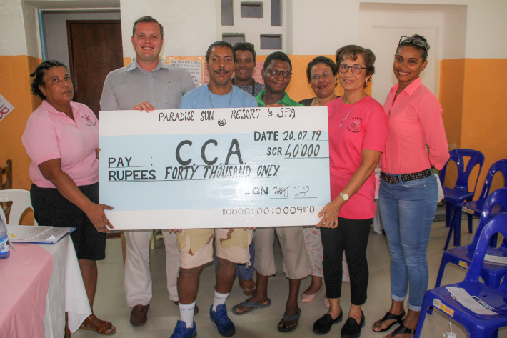 Paradise Sun Hotel, cancer survivor donate to Cancer Concern Association