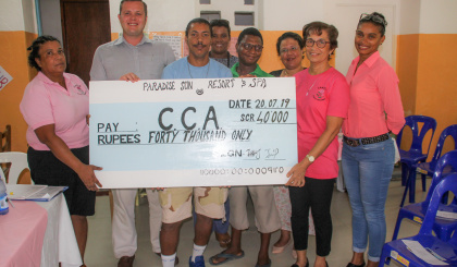 Paradise Sun Hotel, cancer survivor donate to Cancer Concern Association