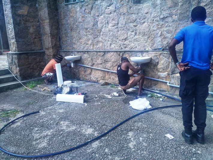 Inmates and prison staff help get St Francis parish church ready for services tomorrow