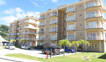 Ten families get keys to their new condos