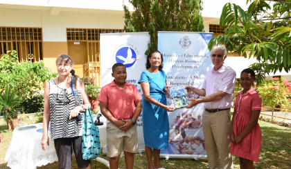 Island Conservation Society donates books to schools