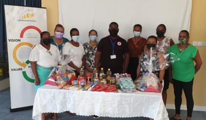 Independent School primary teachers donate food items to Red Cross