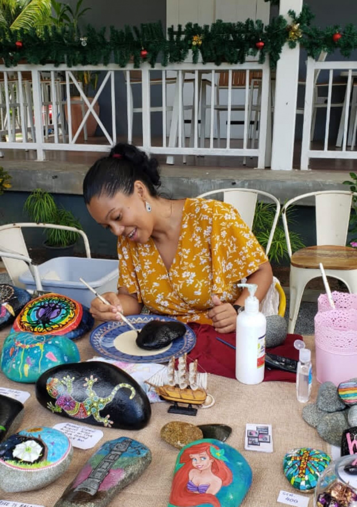 Meet Maria, an artisan creating wearable art in the form of hand-painted wooden earrings