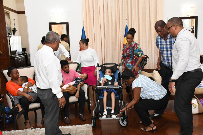Ten children with special needs receive specifically made strollers