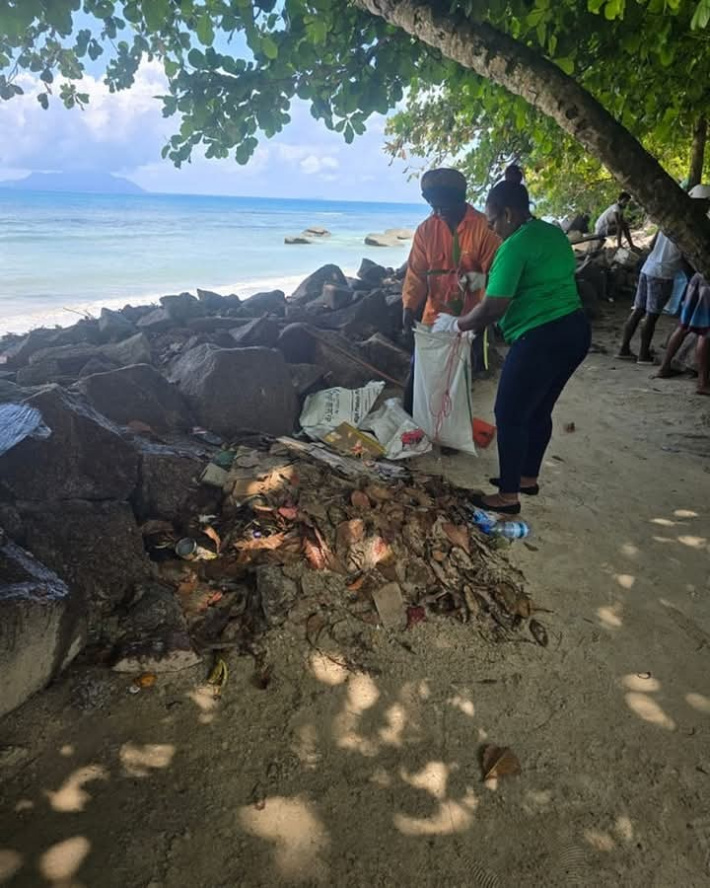 Community, contractors team up for Beau Vallon beach clean-up