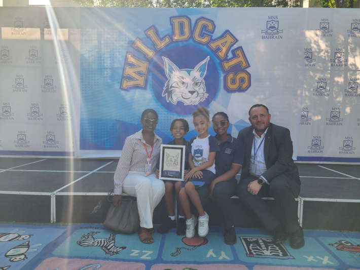 Tyler Schwerm wins multinational school’s first mascot competition