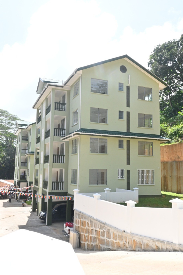 32 families receive  keys to new homes